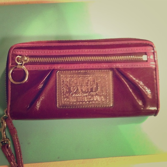 Purple coach wallet with cheetah interior