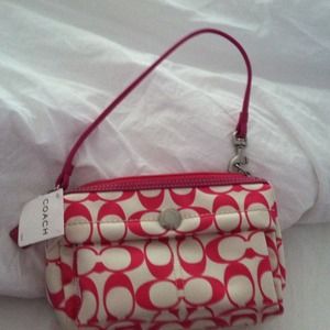 NWT Coach cosmetic bag.