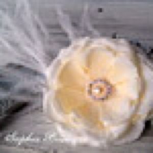 White floral hair fascinator.