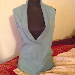 Green sweater vest size small