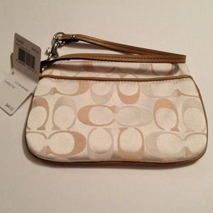 .New authentic coach wristlet