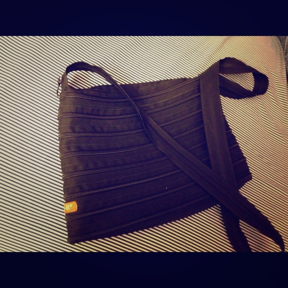 Black Zip it hand bag.