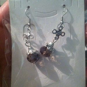 Dangle earrings with a cafe plastic bead