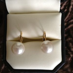 Pearl earrings.