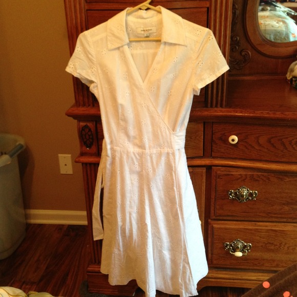 White eyelet pattern wrap dress