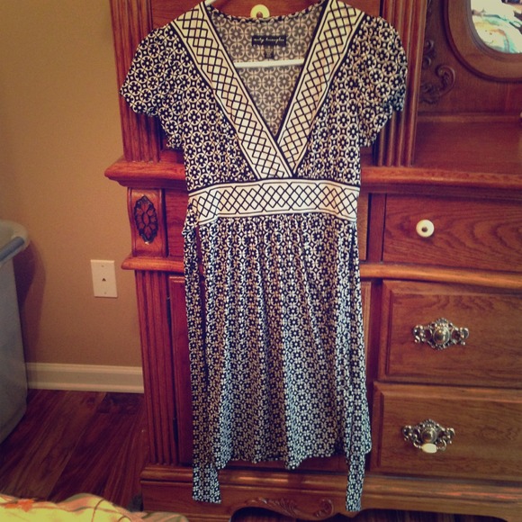 Cute, comfortable black dress with belt.