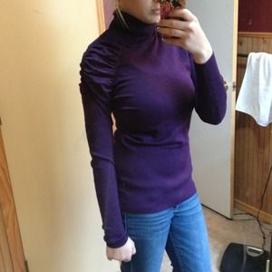 Purple turtleneck sweater with shoulder detail