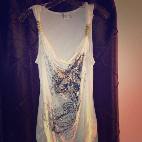 Cream and gold with black and gold flower. Pretty