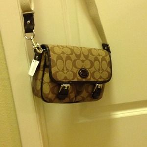 Authentic coach cross body bag