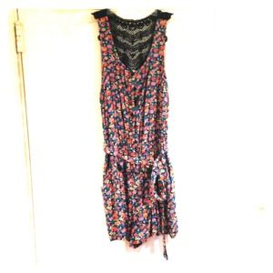 SOLD !! Floral romper with crochet back