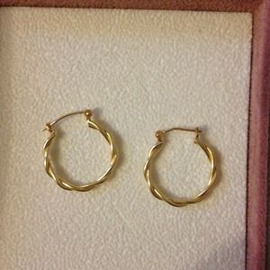 14k gold petite twist hoops on hold