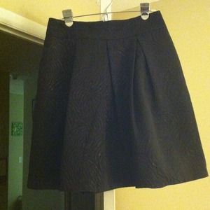 Super cute black skirt.