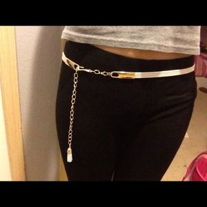 Cute leather belt with gold chain.