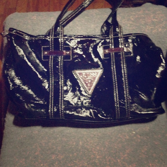 Authentic guessleather bag with silver accents