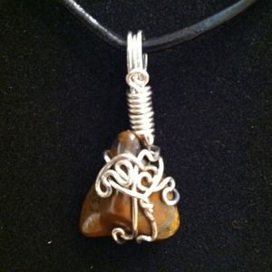 Silver wire and red tiger eye gemstone pendant