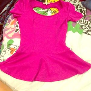 Peplum top with heart cut out back!