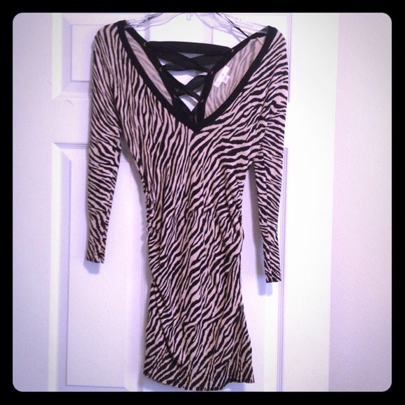 Sexxy lace up back cream & black zebra print dress
