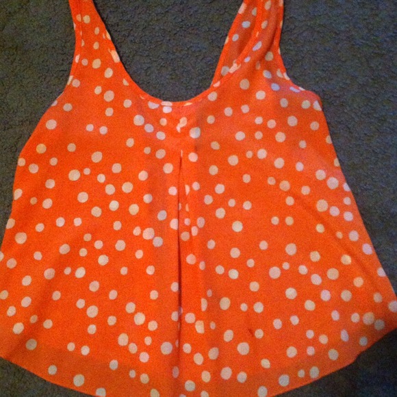 peach top with white polkda dots