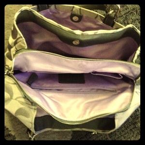 This is 100% authentic, 5 pocket coach purse.