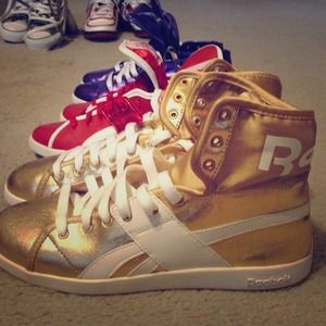 Gold reebok sneakers