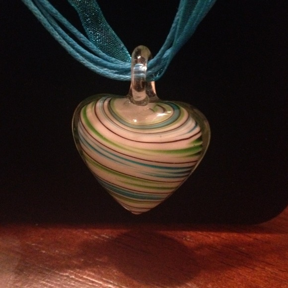 Glass heart pendant on a ribbon necklace