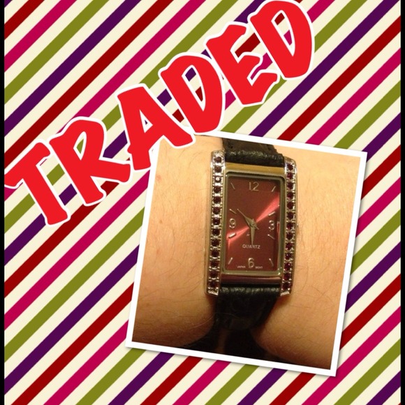 AVON RED CHROME FACE & RED GEM BEZEL WATCH