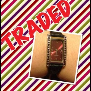 AVON RED CHROME FACE & RED GEM BEZEL WATCH