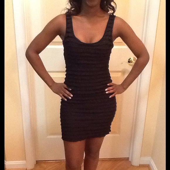 LIttle black form fitting party dress w/ruffles