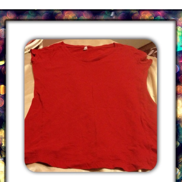 A red max wave short sleeve shirt.