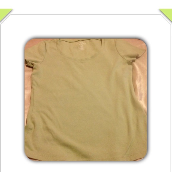 A green short sleeve shirt and a brown one