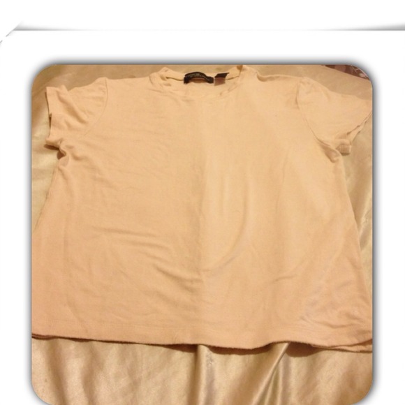 A tan short sleeve shirt.