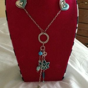 Long necklace featuring heart beads