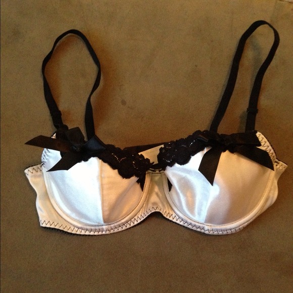 White satin balconette bra with black lace trim