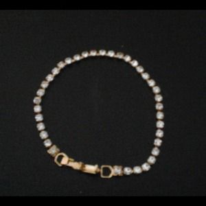 Gold and diamond tennis bracelet
