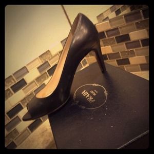Authentic Prada black leather peeptoes