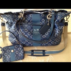 Coach diaper and wristlet.