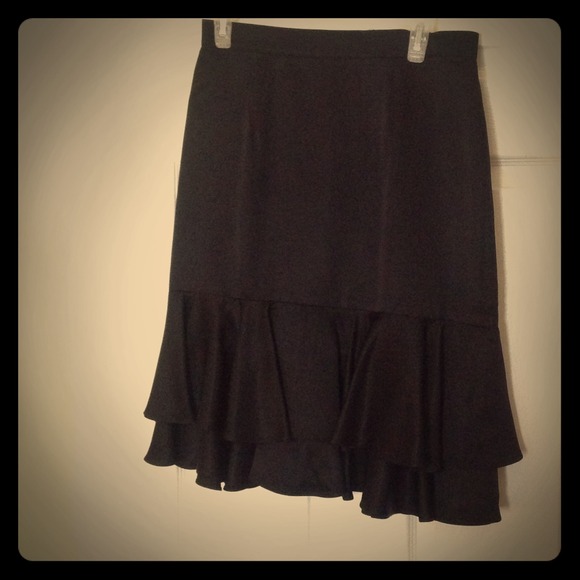 Black ruffle skirt. Dry clean only. Silk like.