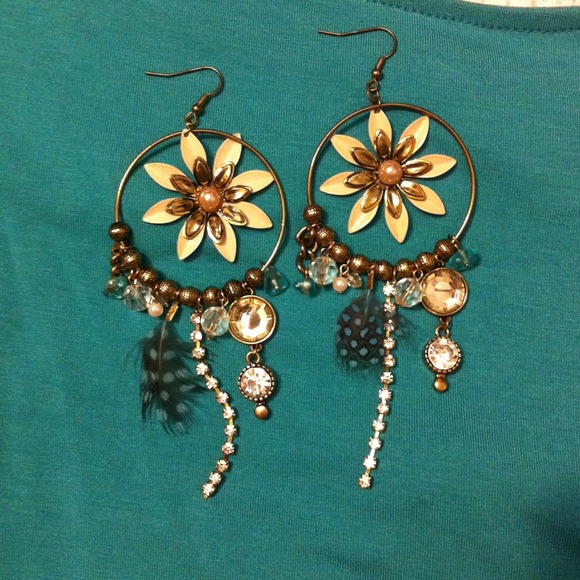 Teal blue white and gold statement earrings.