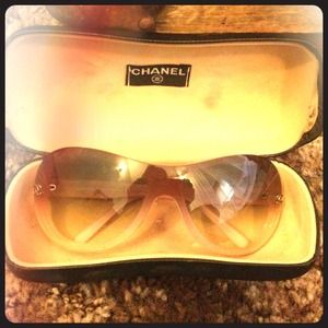 Pink pair of Chanel glasses.