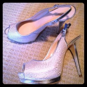 Beautiful silver sling back heel