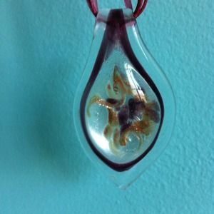 Burgundy necklace with glass floral pendant design