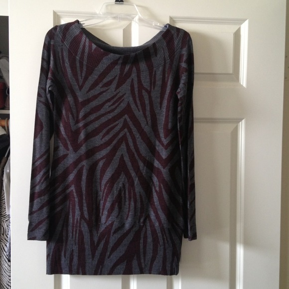 Zebra print gray sweater with maroon print.
