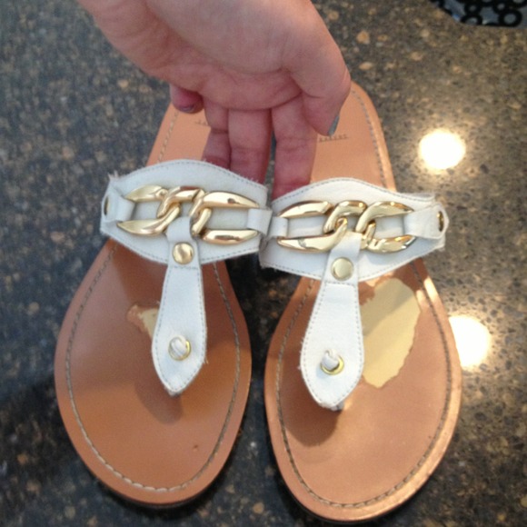 Bakers white flip flops with gold chain accent