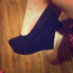 Black suede wedges.
