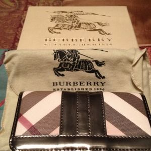Burberry tri-fold wallet.