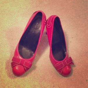 Red bowtie pumps size 8.5