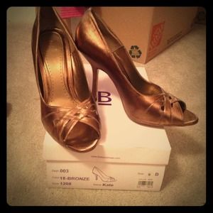 Bakers bronze pumps size 9.  Worn once to a dance