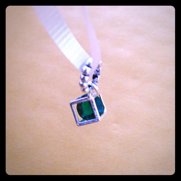 Charm Bracelet w/ green crystal.