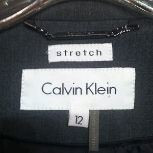 Size 12 Calvin Klein suit in gray. Worn once.