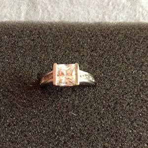 Sterling silver ring with diamond like jewels.